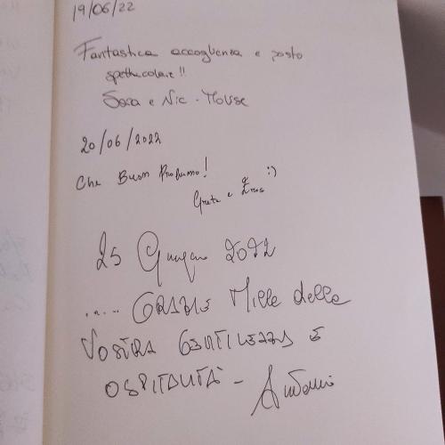 a piece of paper with handwriting on it at La Terrazza del Quarto in LʼAquila