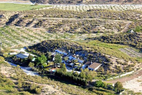 an aerial view of a house in a field at Cuevas Andalucia in Baza