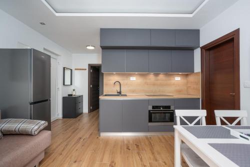 Η κουζίνα ή μικρή κουζίνα στο Small village apartman
