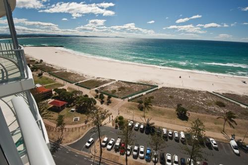 a view of a beach with cars parked on a street at Reflections Tower Two in Gold Coast