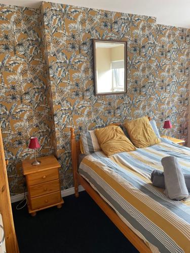 Katil atau katil-katil dalam bilik di Lwr Ormeau Guest House