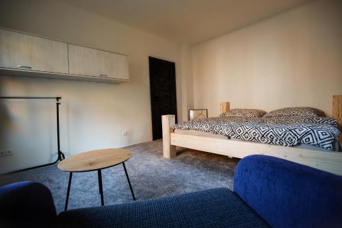 Postel nebo postele na pokoji v ubytování apartmán deVAde se dvěma ložnicemi a WiFi připojením
