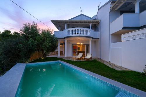 Πισίνα στο ή κοντά στο Playia Villas III