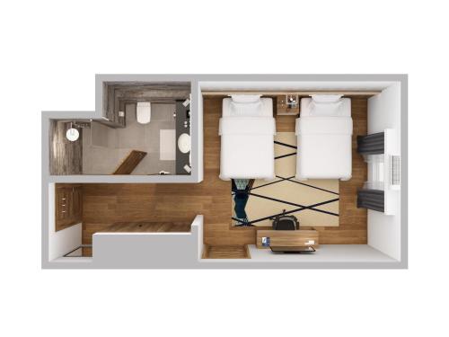 a rendering of a floor plan of a room at Holiday Inn Tabuk by IHG in Tabuk
