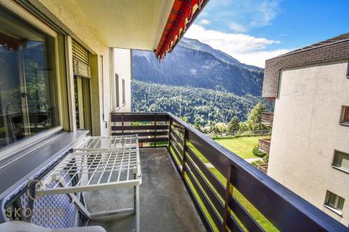a balcony with a view of a mountain at Apartment A im Grünen, Mörel Breiten in Mörel