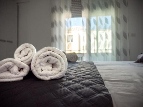 biRose B&B Affittacamereにあるベッド