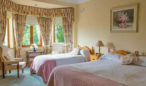Postel nebo postele na pokoji v ubytování Cahergal Farmhouse B&B