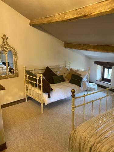 Postel nebo postele na pokoji v ubytování La Cour Blanche