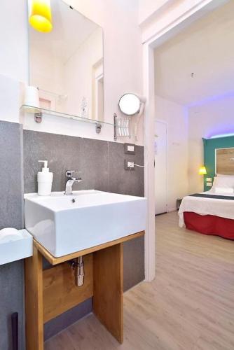 Una cama o camas en una habitación de Misar-36