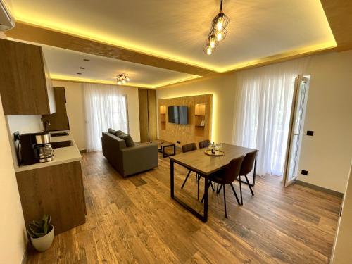 a large living room with a table and a couch at Mangio Dubrovnik Gold in Dubrovnik