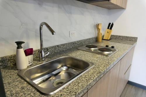 Η κουζίνα ή μικρή κουζίνα στο Elegant-cozy loft in the center historic of Bogotá