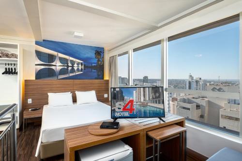 Postel nebo postele na pokoji v ubytování S4 Hotel Águas Claras