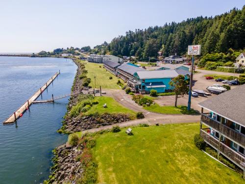 an aerial view of a resort next to the water at Jot's Resort in Gold Beach