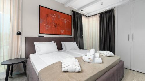 Un pat sau paturi într-o cameră la Villa Curitico