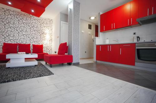 ครัวหรือมุมครัวของ Apartment Red