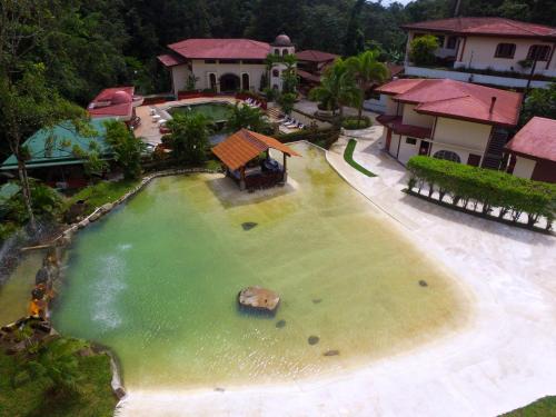 an aerial view of a large pool of water at El Tucano Resort & Thermal Spa in Quesada
