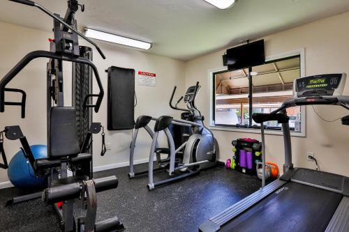 a gym with several treadmills and cardio machines at Midnight Cove II 823 in Siesta Key
