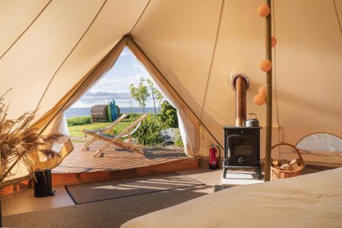 Postel nebo postele na pokoji v ubytování Mönus Paik Glamping