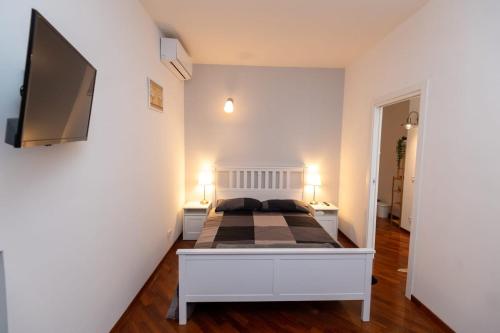 Postel nebo postele na pokoji v ubytování SUITE184
