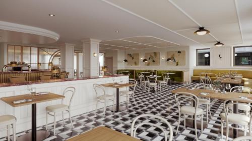 a restaurant with a black and white checkered floor at The Metcalfe by Gray Collection in Ottawa