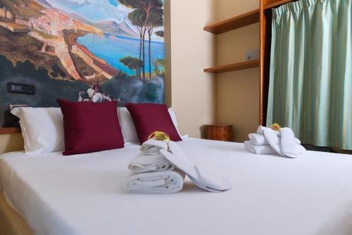 Postel nebo postele na pokoji v ubytování Hotel Suite Ares