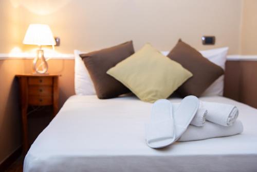 Postel nebo postele na pokoji v ubytování Hotel Suite Ares