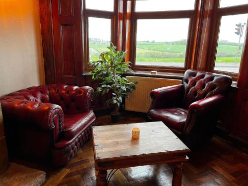 Coin salon dans l'établissement The Renishaw Rooms