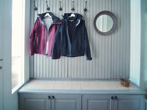 a room with coats hanging on a wall at Haus an der Lieser in Spittal an der Drau