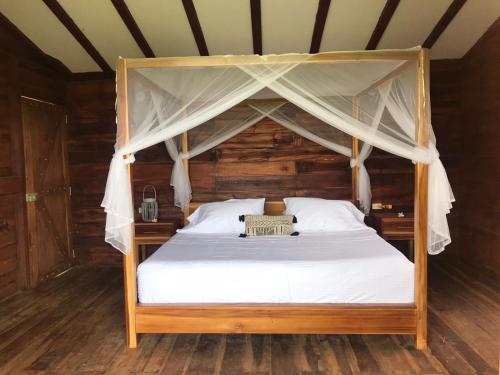 Кровать или кровати в номере La Casita del Bosque