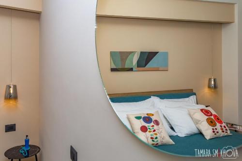 Postel nebo postele na pokoji v ubytování Macramè Fazello Rooms