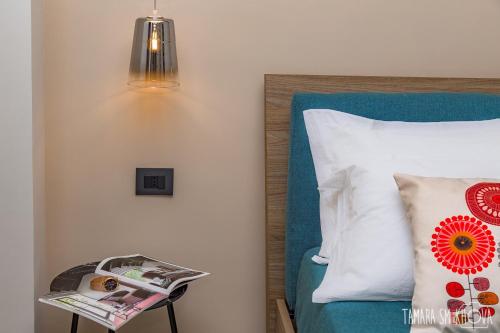 Postel nebo postele na pokoji v ubytování Macramè Fazello Rooms