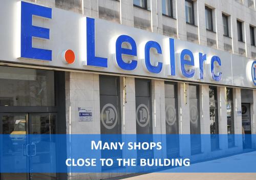 a large building with a large sign on it at Beausoleil Studio Metro Paris Sud in Le Kremlin-Bicêtre