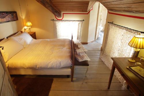 Katil atau katil-katil dalam bilik di Relais Villa Brioschi