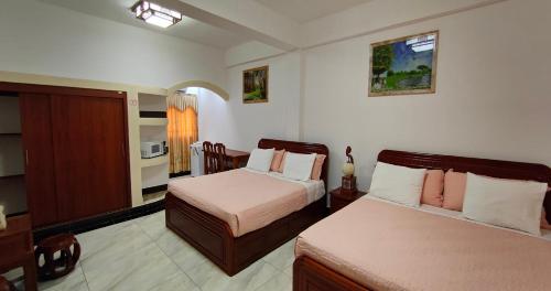 Postel nebo postele na pokoji v ubytování Hotel Pacific Pearl - Playa Los Destiladeros