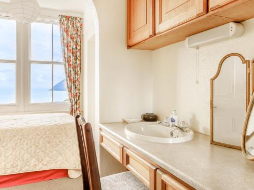 Ένα ή περισσότερα κρεβάτια σε δωμάτιο στο Clooneavin Apartment 3