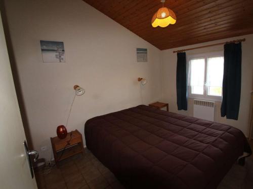 Postel nebo postele na pokoji v ubytování Appartement Dolus-d'Oléron, 2 pièces, 4 personnes - FR-1-246A-141