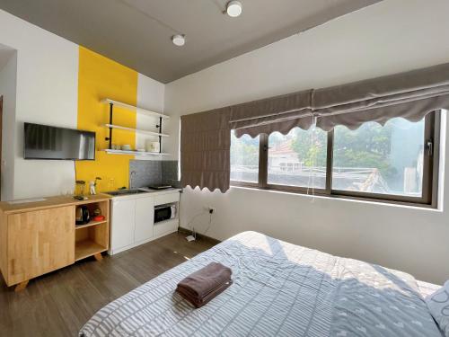 Kuchyň nebo kuchyňský kout v ubytování SaziHome Le Thanh Tong Hanoi