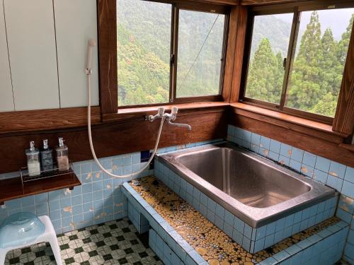 Ванная комната в Guesthouse boro-ya
