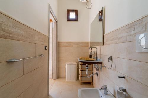 Ένα μπάνιο στο Casa Vacanza Lu Sule