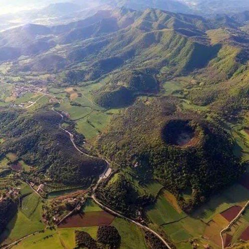 an aerial view of a forested area from an airplane at Mas La Coma in Bas