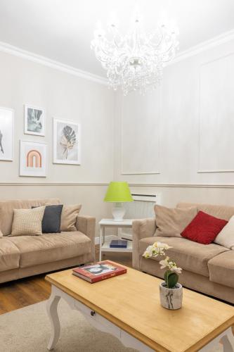 Гостиная зона в Charming apartment with patio a few steps from Colosseum