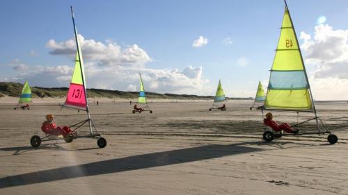 a group of sail boats on the beach at Dormio Resort Berck-sur-Mer in Berck-sur-Mer