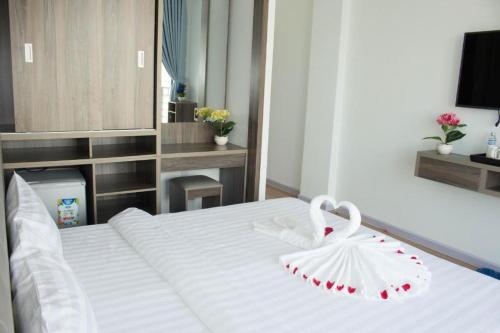 Ein Bett oder Betten in einem Zimmer der Unterkunft Winston Hotel
