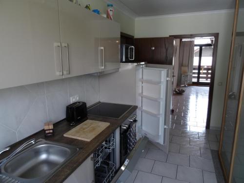 a kitchen with a sink and a counter top at Fewo Lena in Welling