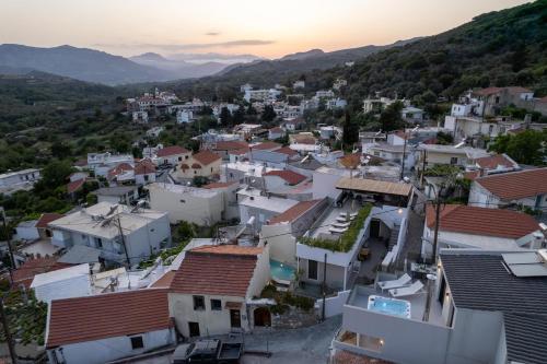 an aerial view of a town at sunset at Casa Teo, By Hellocrete in Spílion