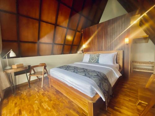 Cama o camas de una habitación en Bukit Tiga Lima Boutique Hotel