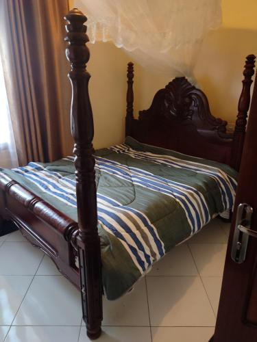 Łóżko lub łóżka w pokoju w obiekcie HEDGE GUEST HOUSE
