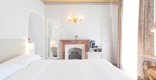 Postel nebo postele na pokoji v ubytování Boutique Hotel Villa Sarnia