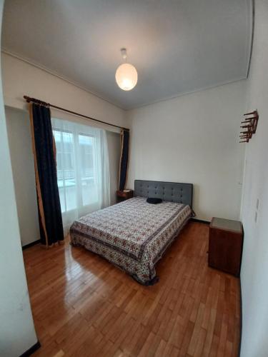 Ένα ή περισσότερα κρεβάτια σε δωμάτιο στο Charming apartment in the neighborhood of Pangrati