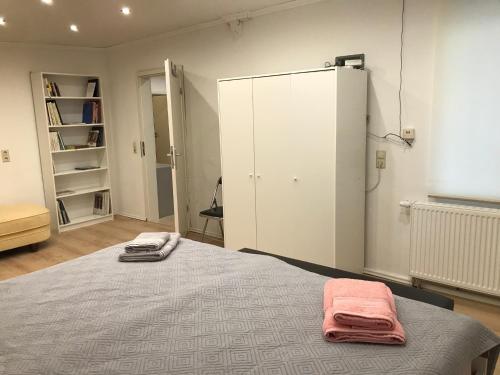 Ένα ή περισσότερα κρεβάτια σε δωμάτιο στο Gästehaus pack of patches